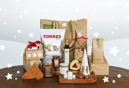 christmas hamper products, featuring wines, charcuterie and mince pies